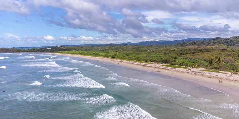 Aerial view of Playa Guiones surfing beach in Nosara Costa Rica